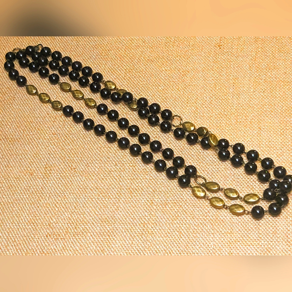 Black and gold/brassy opera necklace